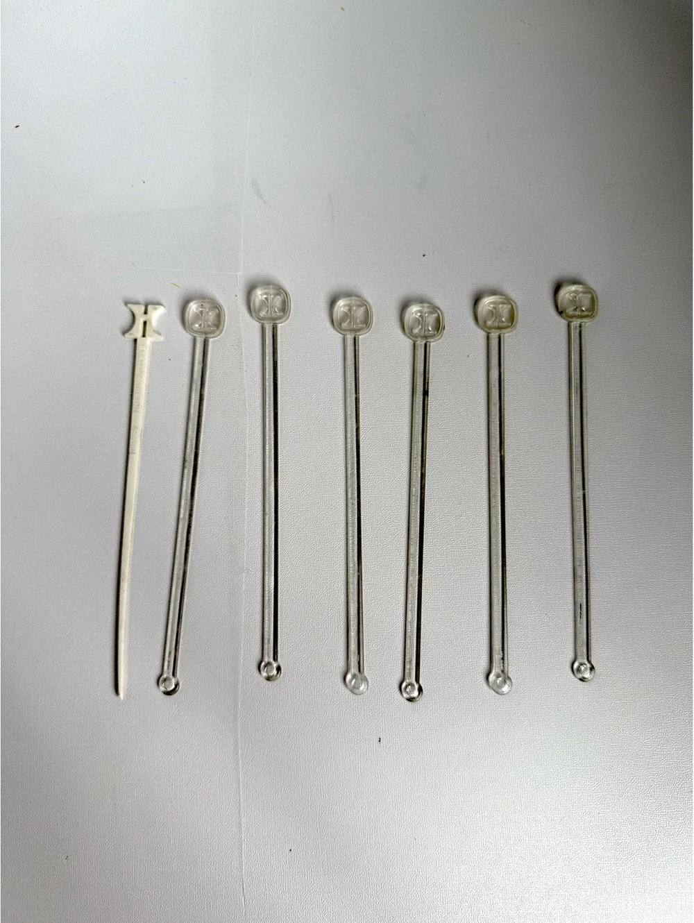 Set of 7 Vintage Clear Plastic Hilton Swizzle Sticks
